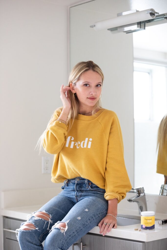 Portrait photography girl with yellow sweater